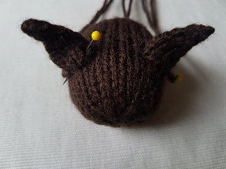 Sewing on knitted bat ears