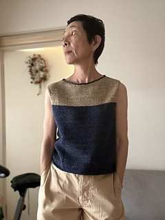 I added an I-cord to the neckline. I changed colors after knitting two-thirds of the armhole.