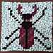 Swaggety Stag Beetle C2C Crochet Square by Deb Ward [HOOKANORY](/designers/hookanory) 
Using green batik yarn, purple space dyed yarn & plain black.