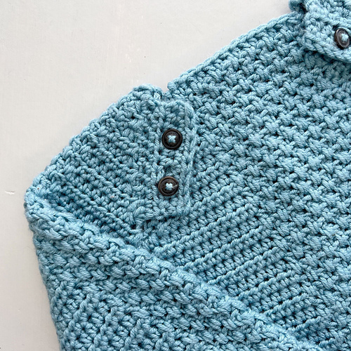 Ravelry Button Baby Sweater pattern by Hannah Cross