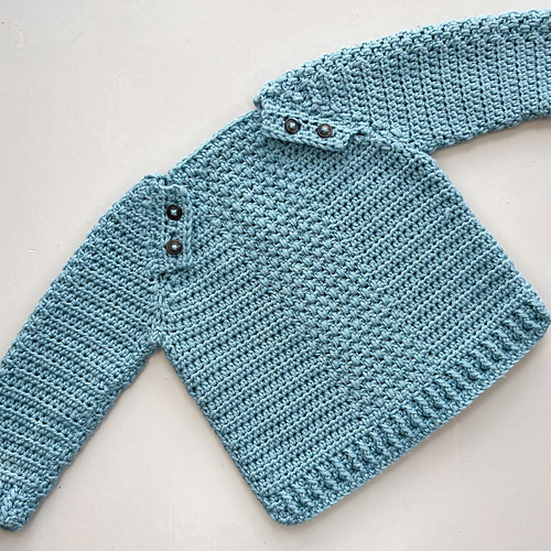 Ravelry Button Baby Sweater pattern by Hannah Cross