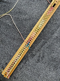 Casting on -- you can see where I ended the first row near the middle of the photo. The remaining cast on stitches will be discarded. 