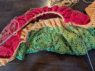 This is what happens if you do the second sleeve three needle bind off and don't switch which needle is the active needle for knitting the rest of the stiches off the spare needle 