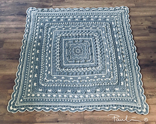 Made by Pauline Vos in just 2 colors. Aran weight, size 180x180 cm