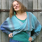 M/L/XL in Jacaranda with Blue Spruce contrast sleeve 
Model is size XL
