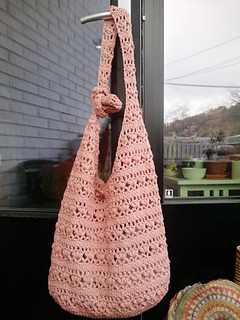 I designed the bag
I crocheted a bag
I took a photo of the bag