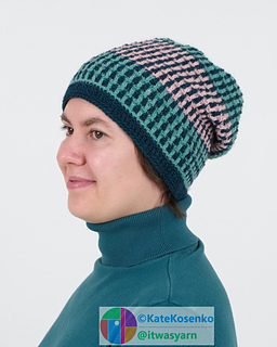 A woman wearing a loose, cozy beanie made with DK weight yarn.

