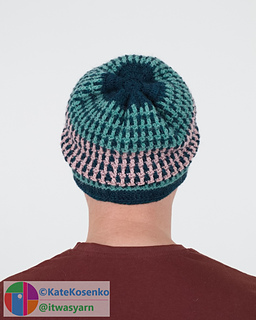 Back view: a man wearing a striped crochet beanie.
