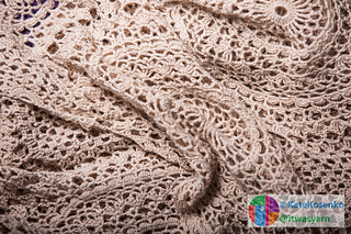 Airy crochet shawl with delicate stitch design