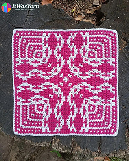 Pearl gray and currant Resonance crochet square on a wooden stump.