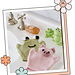 Frog and pig baby bath mitt knitting pattern in King Cole Cottonsoft DK, free pattern on the blog jane burns