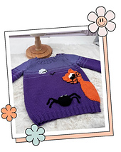 Scaredy Cat kids Halloween jumper knitting pattern, purple jumper with an orange cat and black spider, laid flat