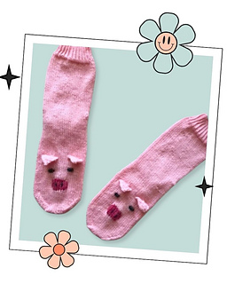 Pair of pink hand knitted pig socks laid flat, top down sock knitting pattern in child, teen and adult sizes