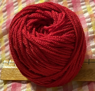 2025-08-07 Two and a quarter inch ball of yarn left.