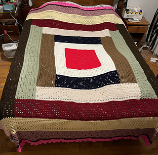 2023-05-22 Finally! It’s in use on our bed! 

I do believe it the largest blanket I’ve ever crocheted. Certainly the most colourful. :two_hearts: