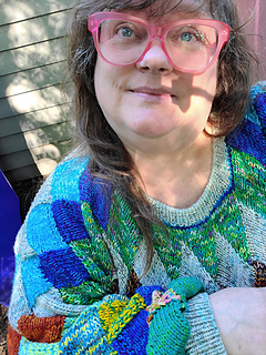 Tubular bind off on neck and cuffs. It gives such a lovely finish.