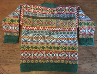 Ravelry: Fair Isle Baby Cardigan pattern by Honey Pollack