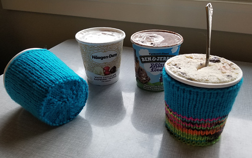 Bottom and front views of ice cream cozy on two pint size ice cream containers.