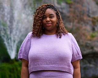 Size 13 on 52"/130 cm chest circumference. Uses Bust Dart Option B and Sugarplum Circus Charlotte DK in colorway Macaron.