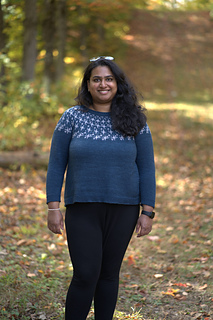 I am wearing a size 5, knit with 2" of ease