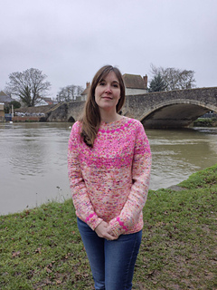 Sarah is wearing a size 2 sweater