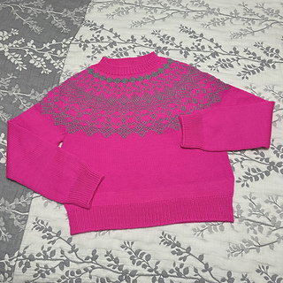 Maureen is wearing a size 2 sweater