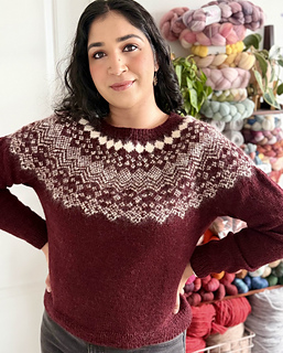 Shreya is wearing a size 4 sweater