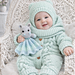Knitting pattern bundle for babies featuring a light blue hand-knitted romper with braided cable design and wooden heart buttons, matching bonnet with ties, cozy booties, and a cute crochet mouse comfort toy. 