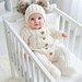 Create a beautiful and cozy baby outfit with this Heart Stitch Jumpsuit Knitting Pattern.
