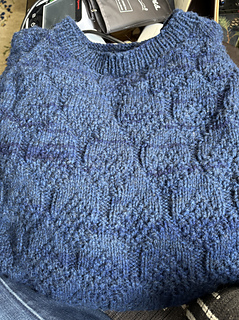 This single-color version uses a ribbed neckline instead of the moss stitch listed in pattern.