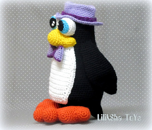Penguin wearing a hat and a bow tie. photo 2