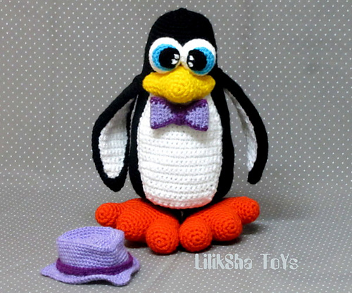 Penguin wearing a hat and a bow tie. photo 3