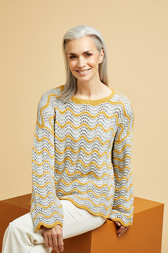 Ravelry: 10671 Fan & Feather Stitch Top pattern by Sirdar