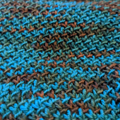 Close up of the stitch pattern. Knit flat, alternating yarn every two rows.