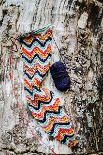 Size 1 knit in a mix of 7 sport to worsted weight scraps