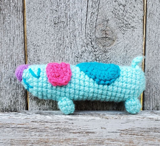 Ravelry: Bluey-Inspired Long Dog pattern by MadeByCana