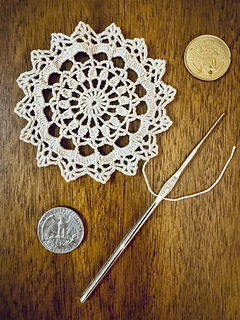 Size comparison of my first attempt to find gauge. This motif is still 1/2” too large.