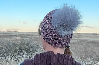 Size 2 pictured on 22.5in head circumference, (7.5in of negative ease)