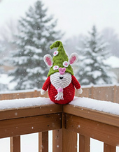 Digital mockup of the crochet toy styled in a Christmas scene. Actual handmade toy shown in other photos
