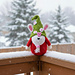 Digital mockup of the crochet toy styled in a Christmas scene. Actual handmade toy shown in other photos