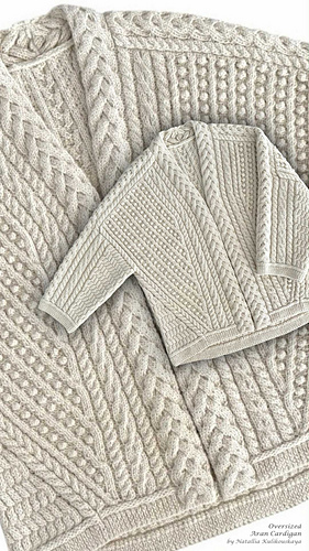 This open-front Oversized Aran Cardigan features an intricate array of textured cables in the traditional Irish Aran knitting technique. The central chunky cable is exceptionally textured and fully reversible – a signature design detail that ensures a beautifully finished edge from both sides. The sophisticated cable patterns not only create visual depth and interest but also enhance the garment's durability and structure. The generous, oversized silhouette offers a relaxed, contemporary fit that works beautifully styled loosely or cinched at the waist.