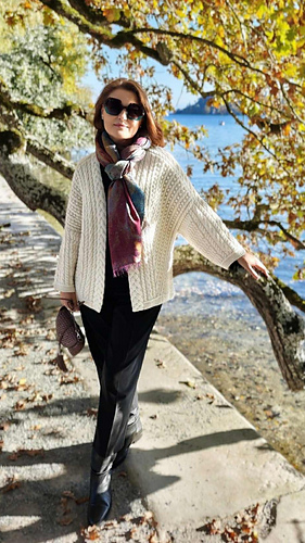 
Elegant city stroll
Create an elegant city or evening outfit by styling the cardigan with black tailored trousers or a slip dress, heeled ankle boots and a colourful scarf or statement necklace.

