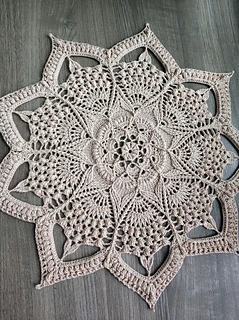 Detailed view of the Arabesque crochet pattern, highlighting the stitch structure and texture of the design