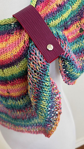 You'll find this Embossed vegan shawl cuff and others in our Accessories section.