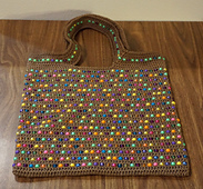 So far, the only thing I have made with totally random choice of color for bead, except for the handle.