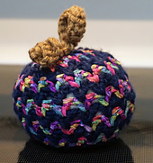 This turned out pretty cute.  I am still experimenting with the clown puke, turned cute, yarn.  I have a BUNCH of it! 