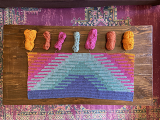 Intarsia crochet process: Each section of color is worked from its own ball of yarn.