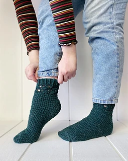 Optional detailing near the cuff can make the Mullinger Socks just a little feminine