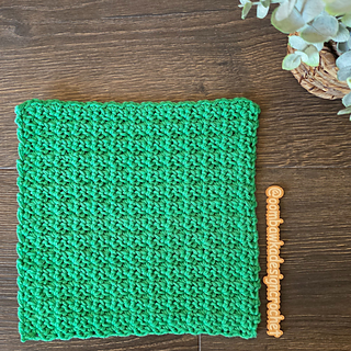 This free crochet pattern is made using single crochet and chain stitches with a simple one-row repeat. It works up fast, making it a great stashbuster and gift idea.