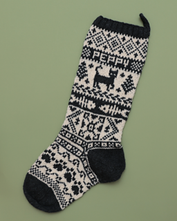 Sam customized her cat stockings using a DK weight yarn, 3.5mm (US 4) needles, and a mix of charts from various sources.